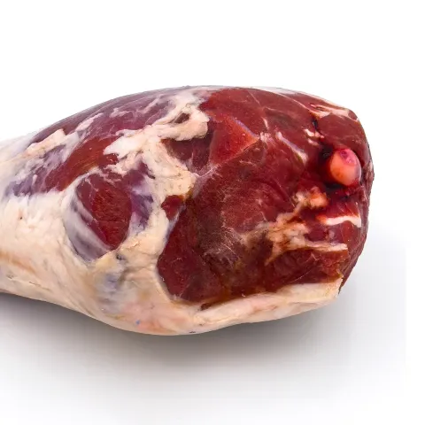 Close-up texture of Lumina lamb leg showing fine marbling