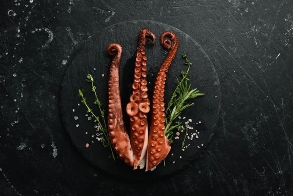 boiled-octopus-tentacles-spices-herbs-600w-2159659415
