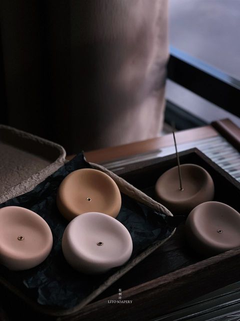 beige incense holder