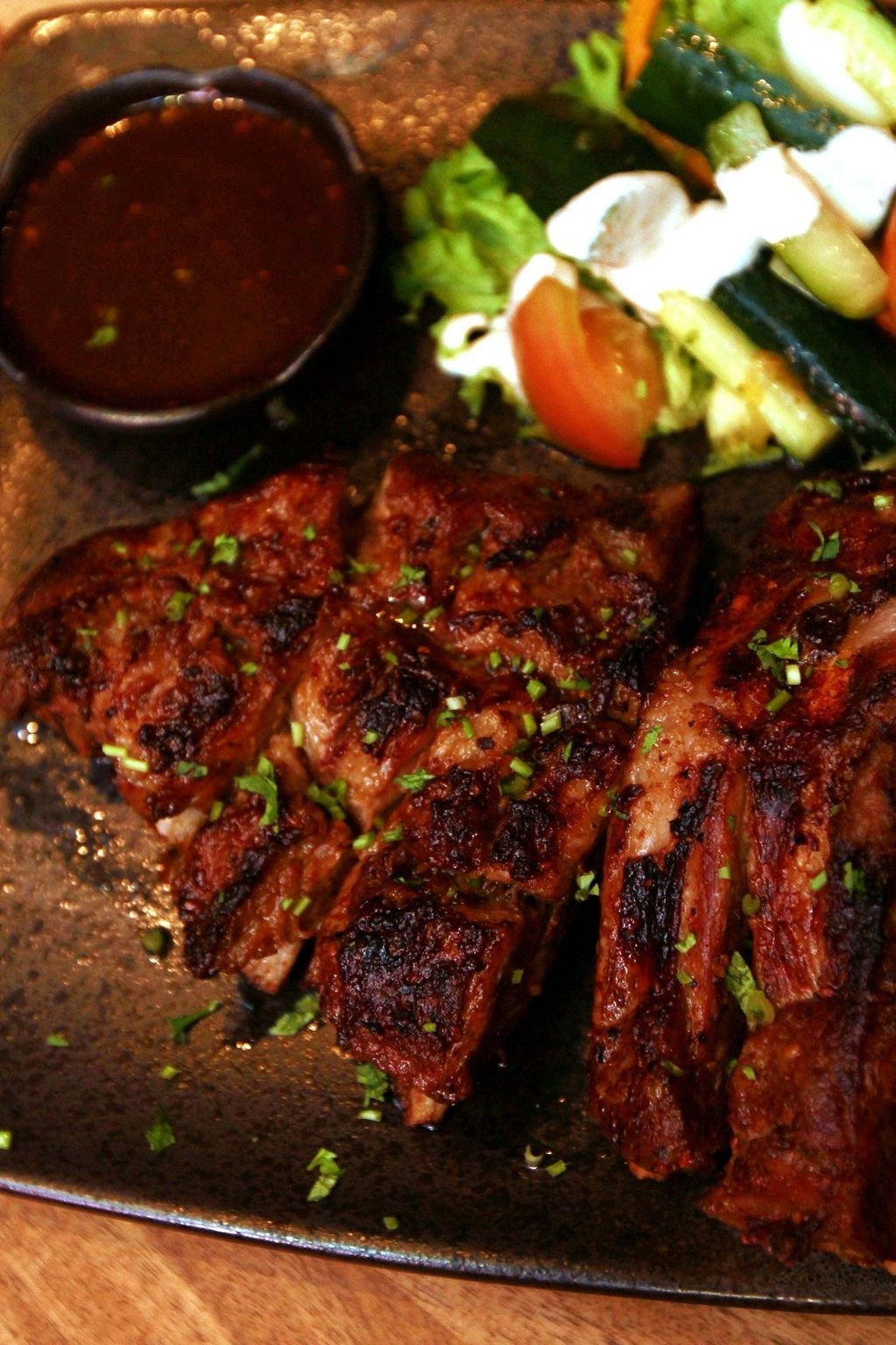 Iberico-pork-ribs-served-with-Black-Markets-house-specialty-sauce.jpg