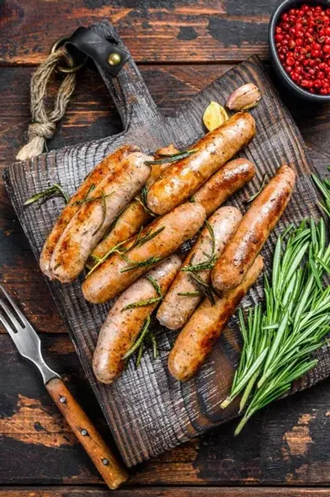 depositphotos_423094716-stock-photo-grilling-bavarian-sausages-cutting-board