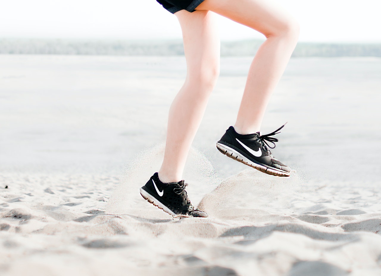 photo-of-woman-wearing-pair-of-black-nike-running-shoes-1166868 (1).jpg