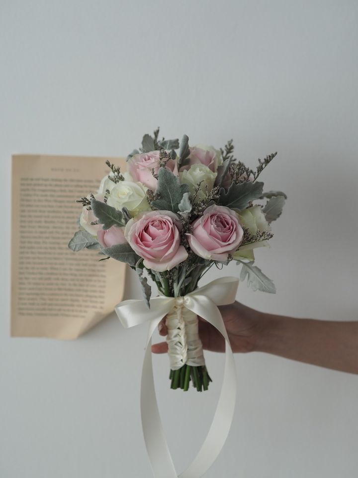 white roses match with pink avalanche and lesser green bridal hand bouquet - RM218