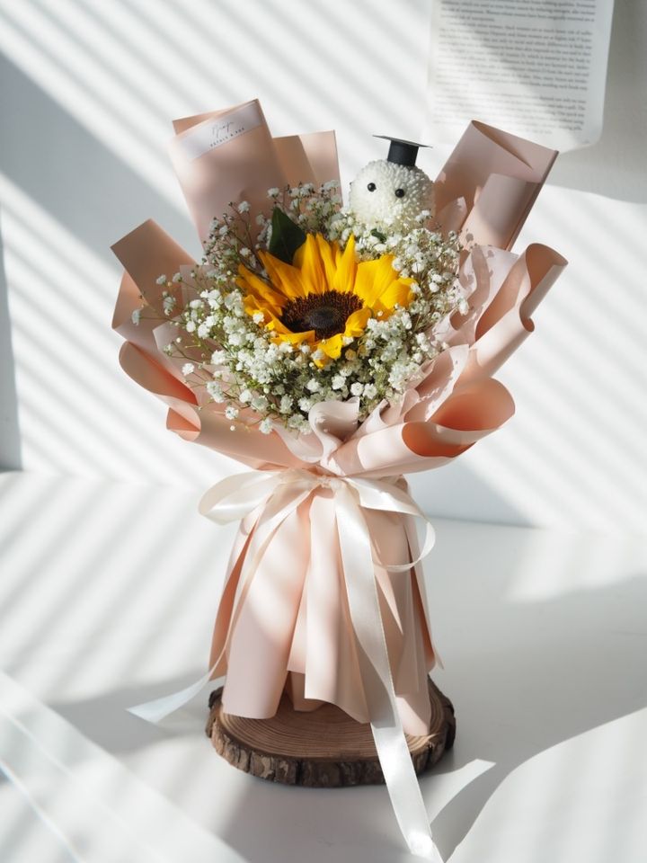 Single Sunflower with baby breath and Graduation Guy - RM119.