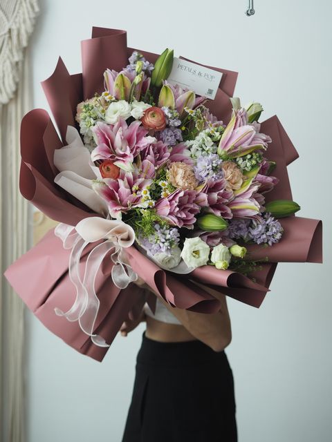 [25]$ Lilies with carnation mix with foliage - rm288.