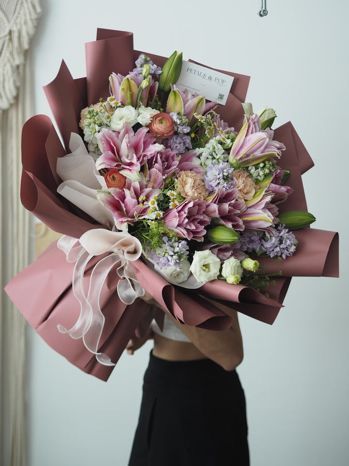 [25]$ Lilies with carnation mix with foliage - rm288.