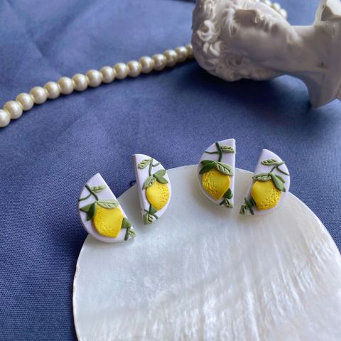 049-6 Lemon Tree White Semicircle Studs.jpg