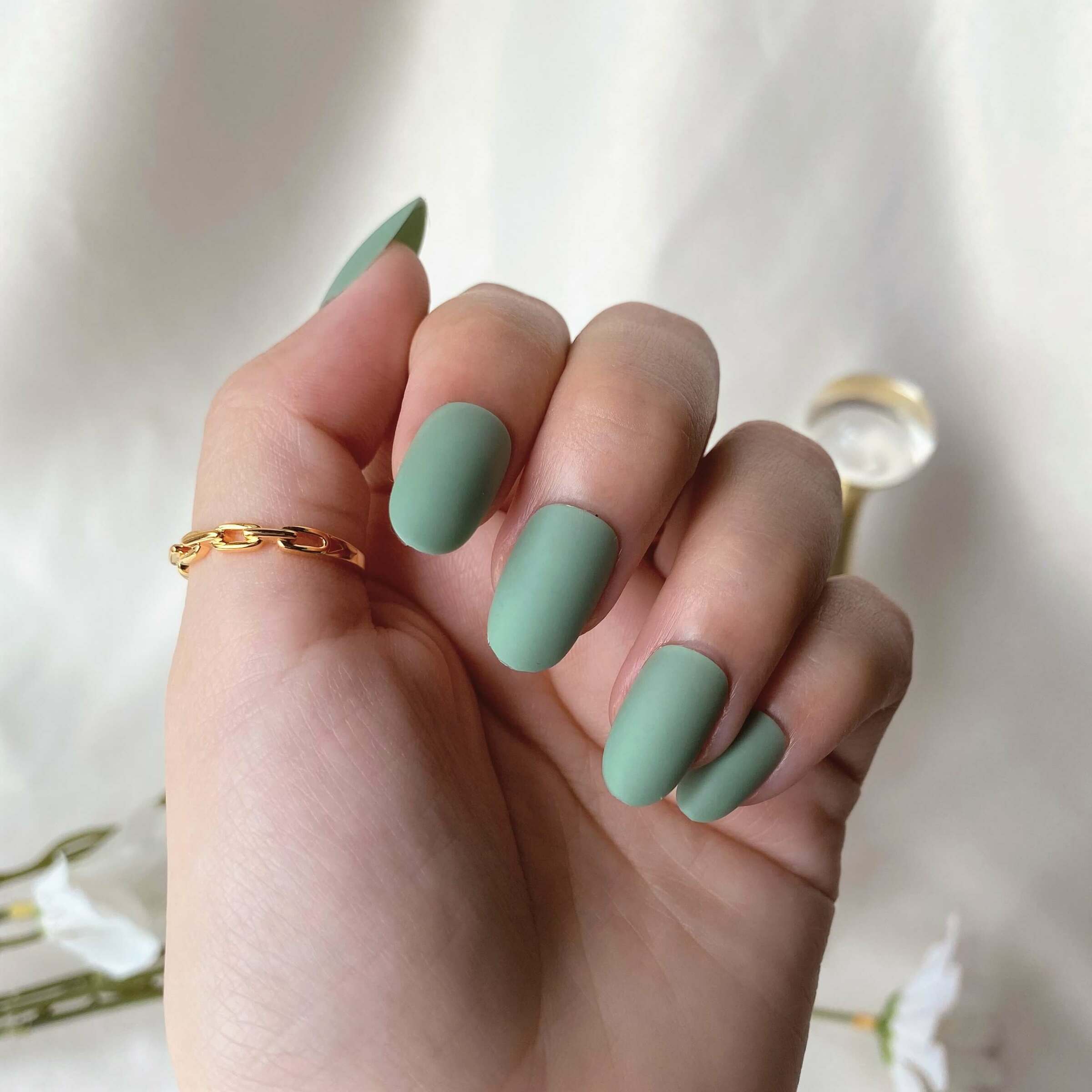C-002 Fresh Breeze - Jade Green Solid Color Press-on Manicure hand.jpg