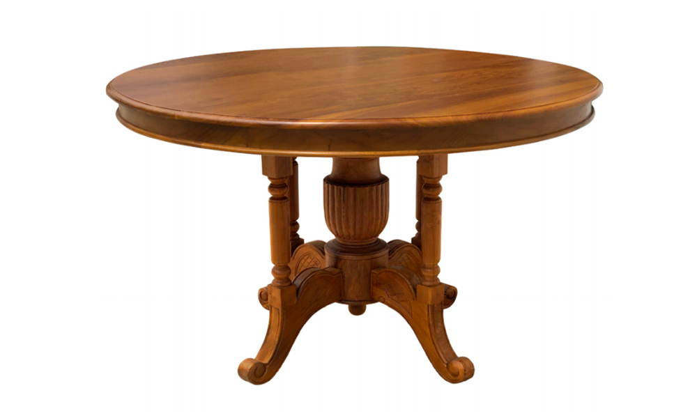 Round wood dining table with fancy legs in Brown