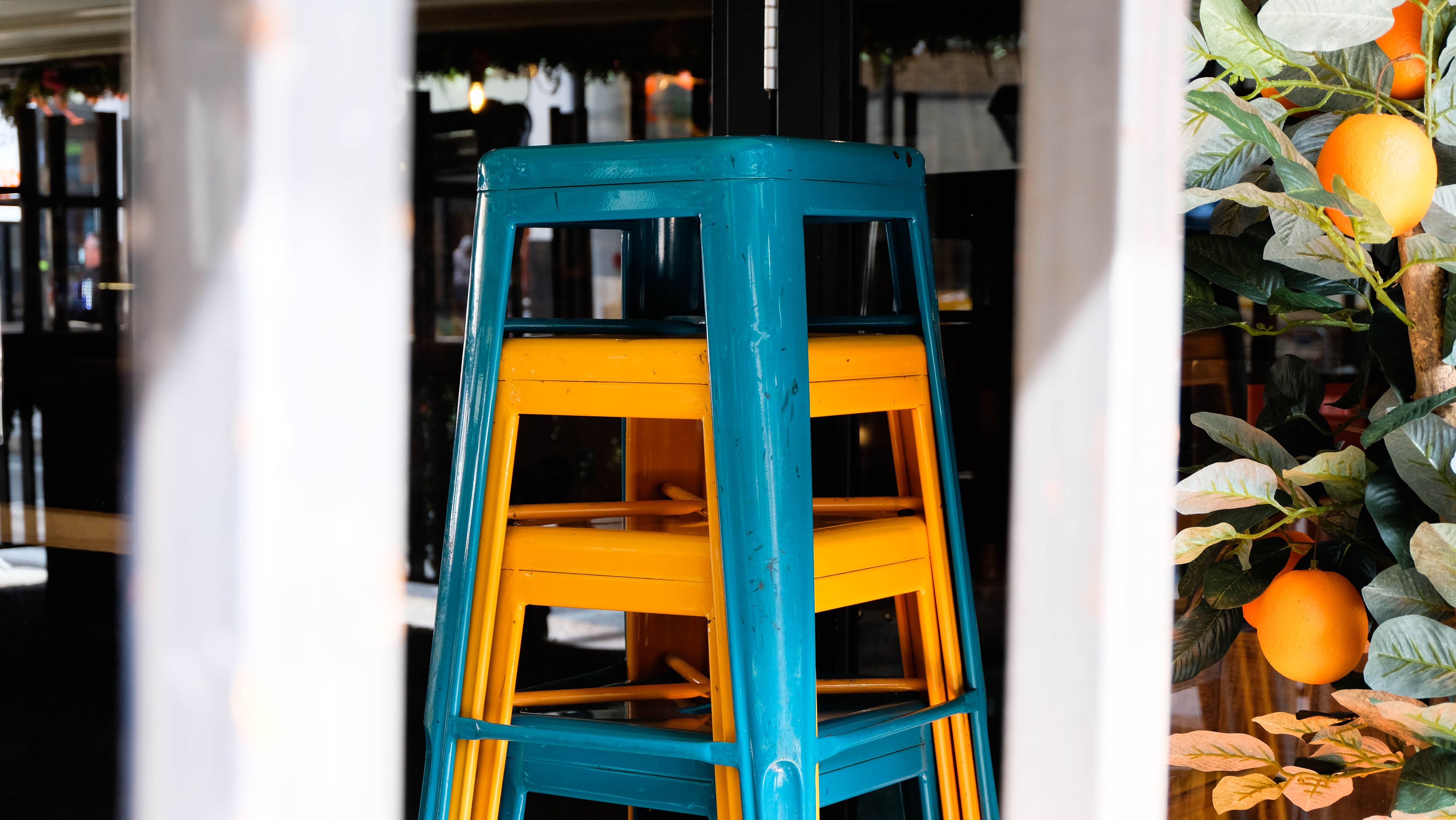 Blue and yellow metal industrial style bar stool