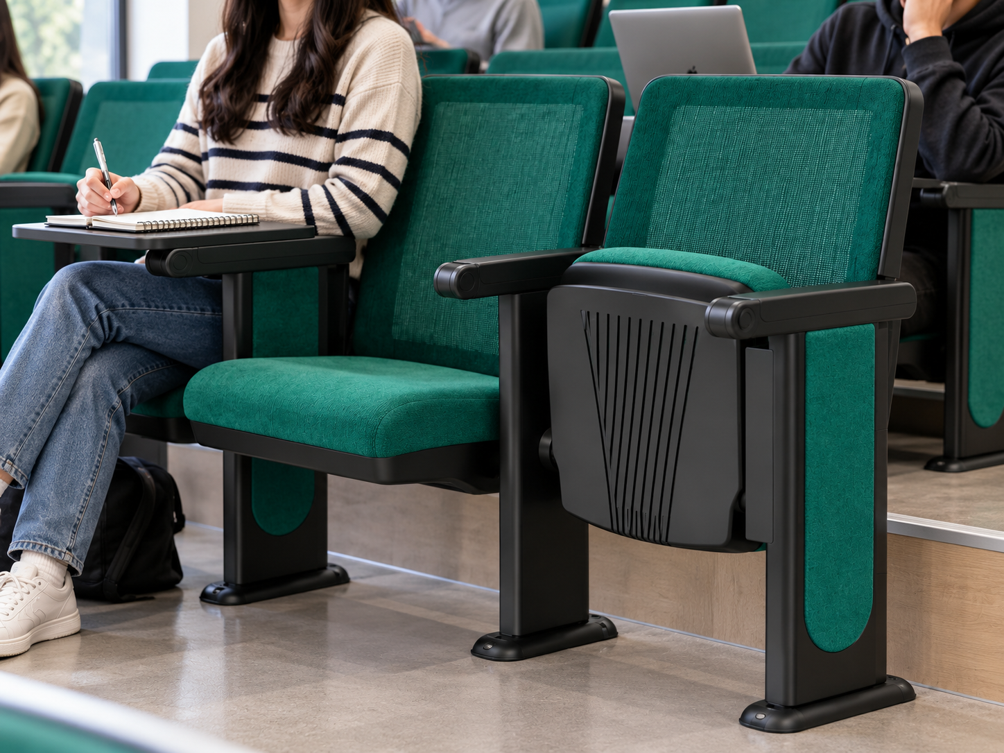 Lecture hall chair dimensions and clear row spacing diagram