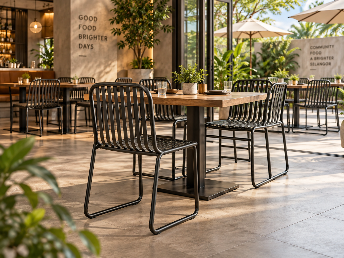 Black metal restaurant dining chairs in a contemporary Selangor restaurant setting