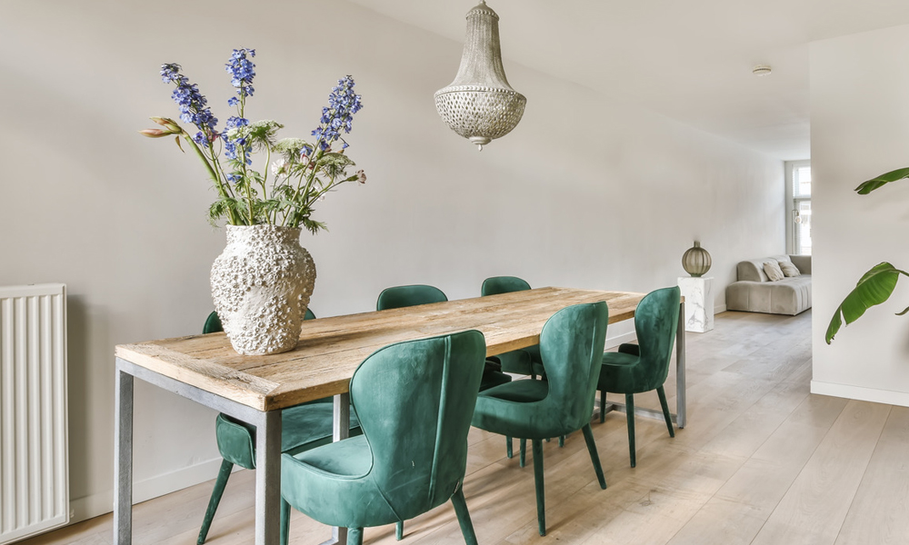 Rustic wood rectangular with metal legs dining table and green velvet dining chairs