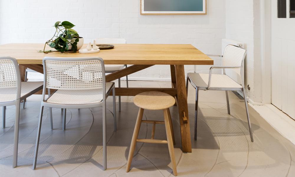 Scandinavian dining table with minimalist grey dining chairs
