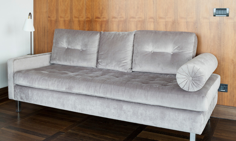 Velvet material sofa bed in grey colour