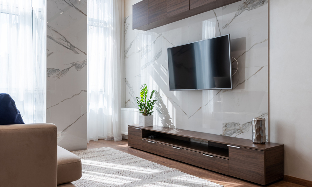 minimalist living room interior with brown wooden TV cabinet 