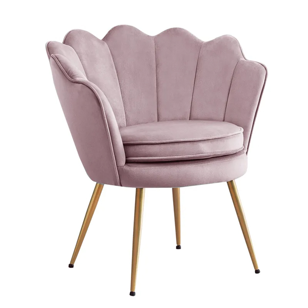 Shell-shaped velvet arm dining chair in pink for cafe use