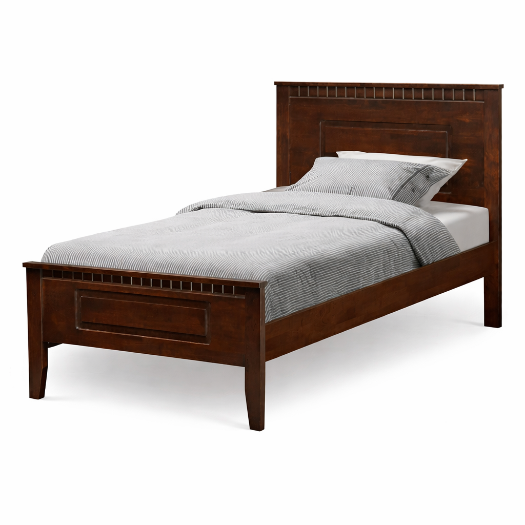 Traditional wooden bed with striped bedding