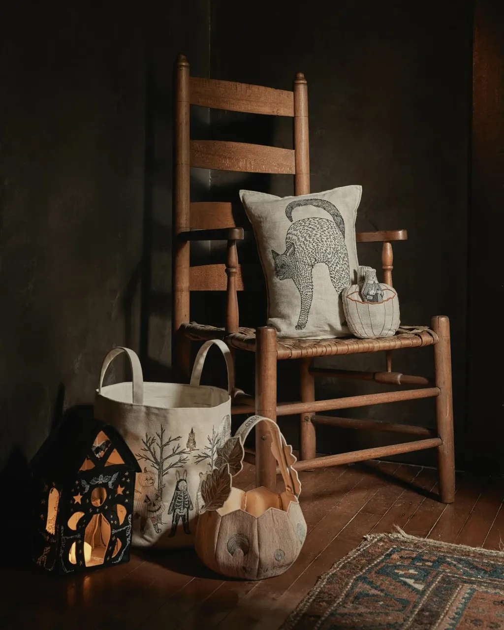 coralandtusk_halloween_foyer_chair_pillows_decor