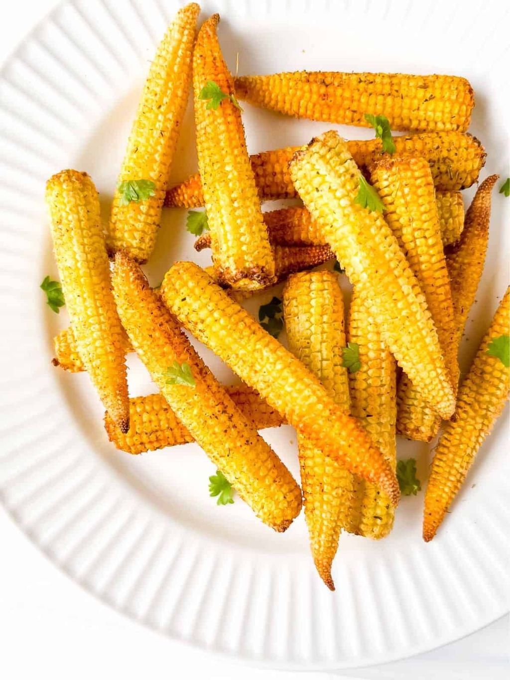air-fryer-baby-corn-on-a-white-plate