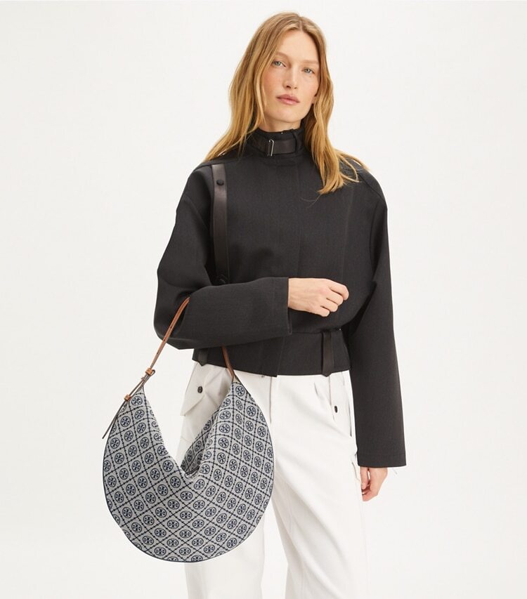 Tory Burch designer hobo bags T Monogram Balloon Bag in Tory Navy additional on model