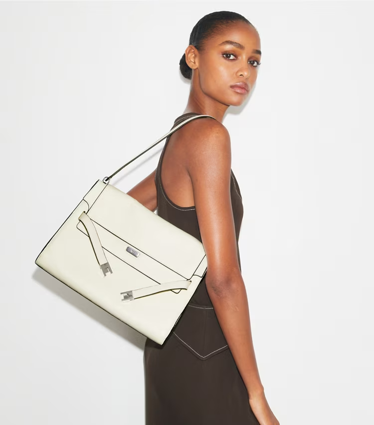 Tory Burch designer shoulder bags Large Lee Radziwill Shoulder Bag in Ivory accessory on model