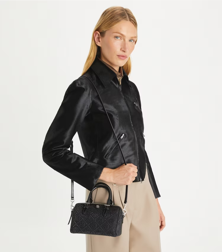 Tory Burch designer crossbody bags T Monogram Embellished Petite Barrel Bag in Black accessory on model