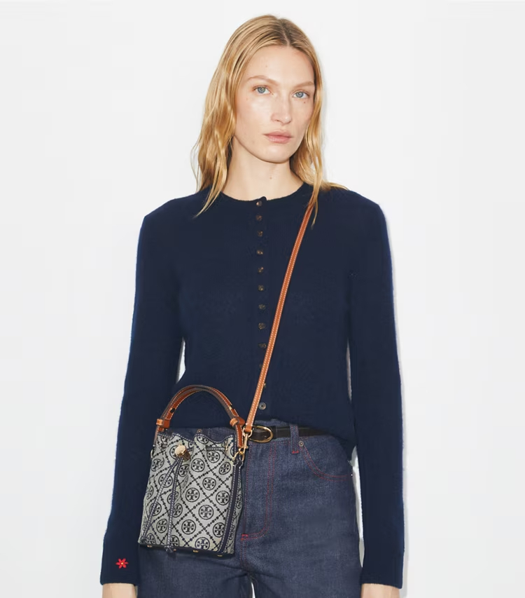 Tory Burch designer crossbody bags T Monogram Mini Bucket Bag in Tory Navy accessory on model