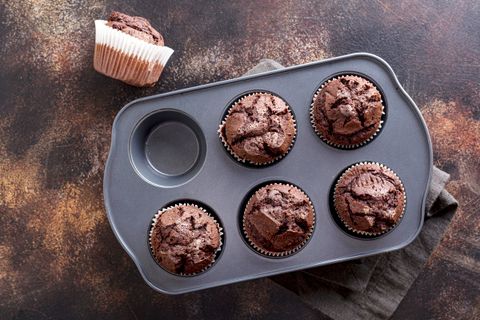 top-view-chocolate-muffins-tray-with-cloth.jpg