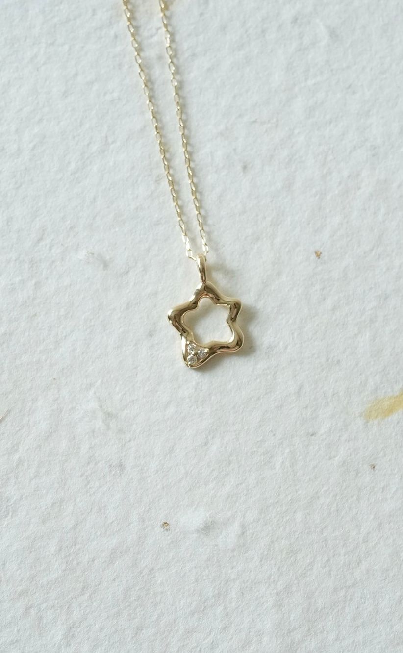 k10-diamond-star-outline-necklace.jpg