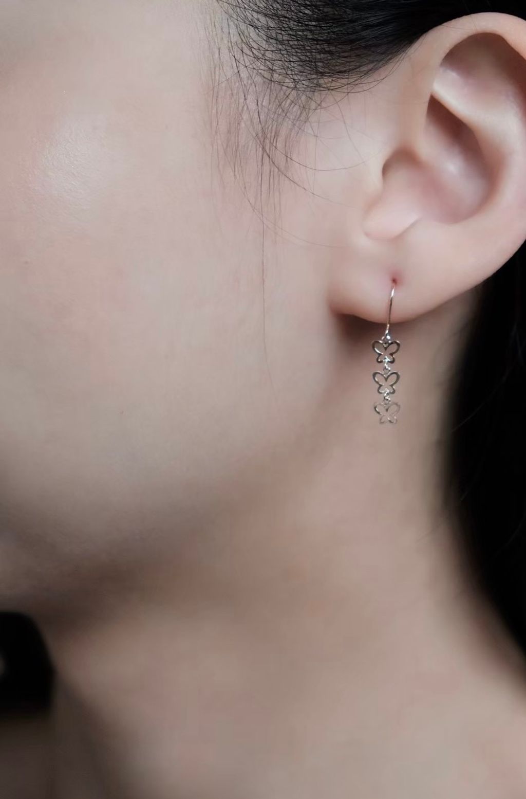 k10-butterfly-drop-earrings-wearing.jpg