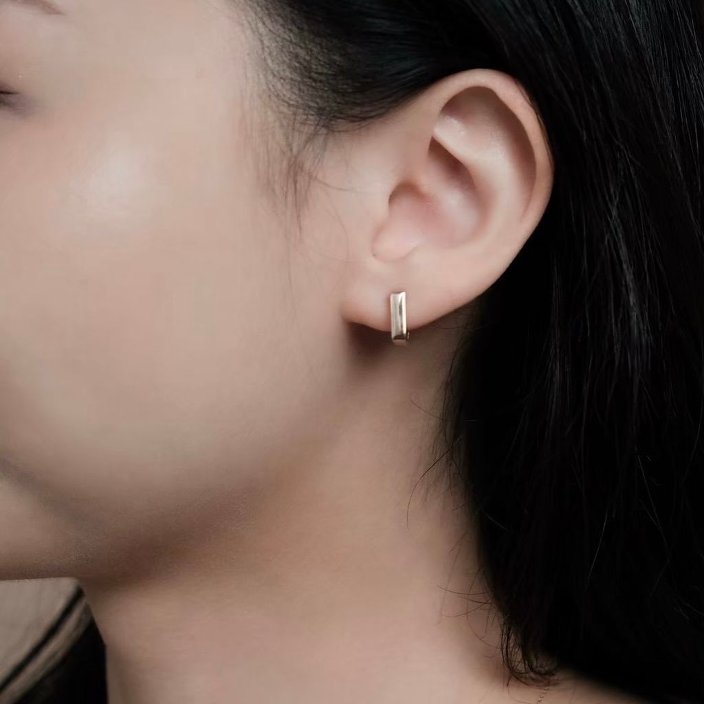 k10-square-gold-earrings-wearing.jpg