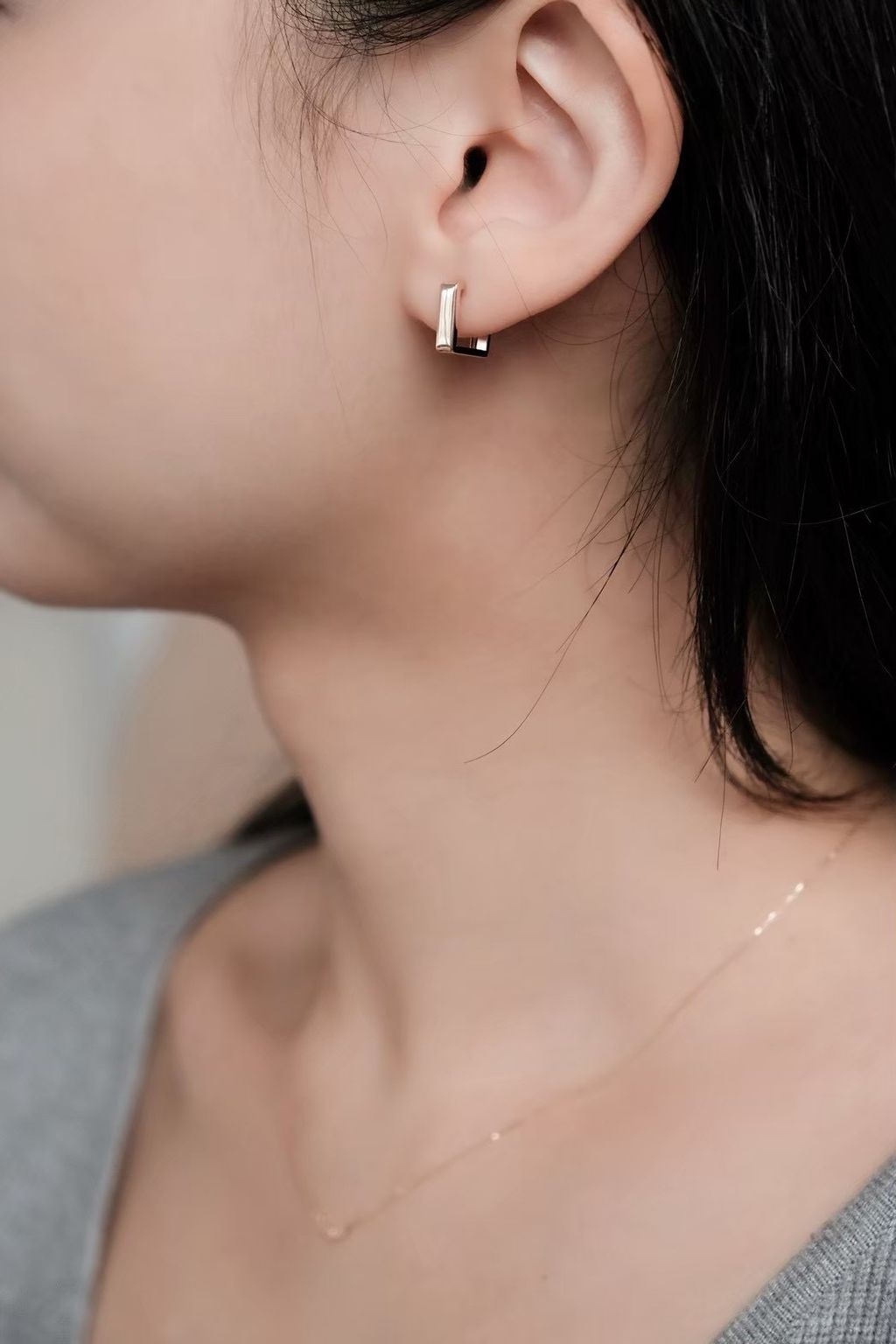k10-square-gold-earrings-wearing.jpg