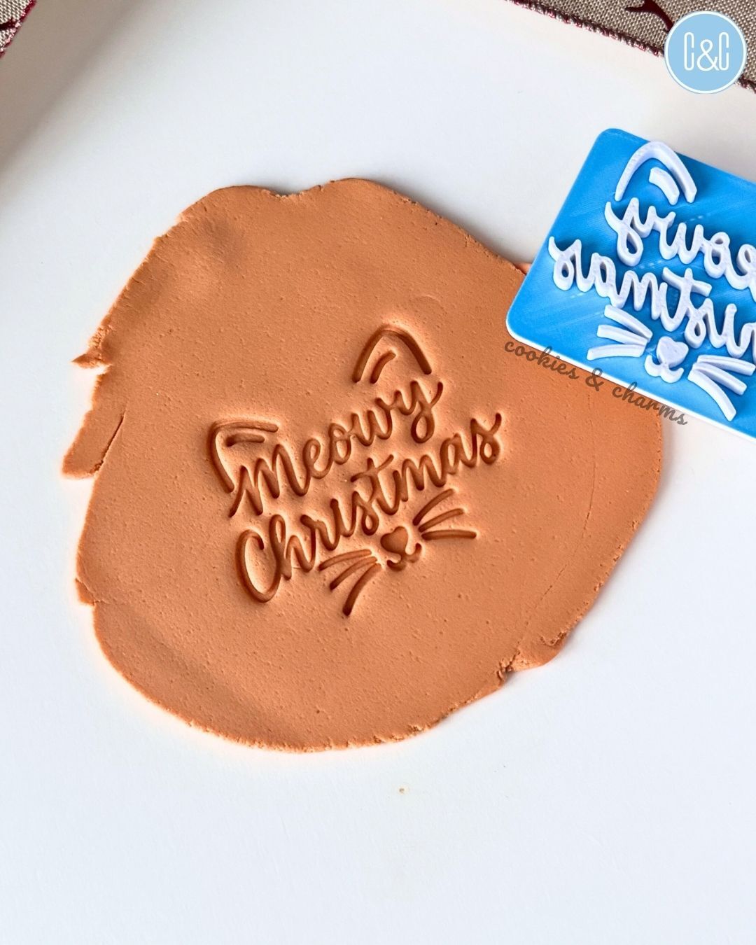 meowy christmas embosser