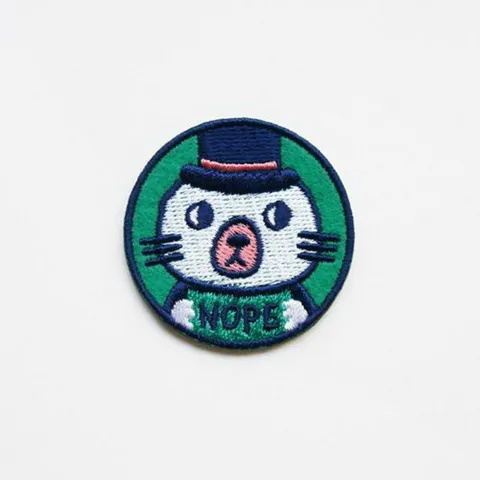 NOPE-STICKER-PATCH-OR-PIN-1-500x500.jpg