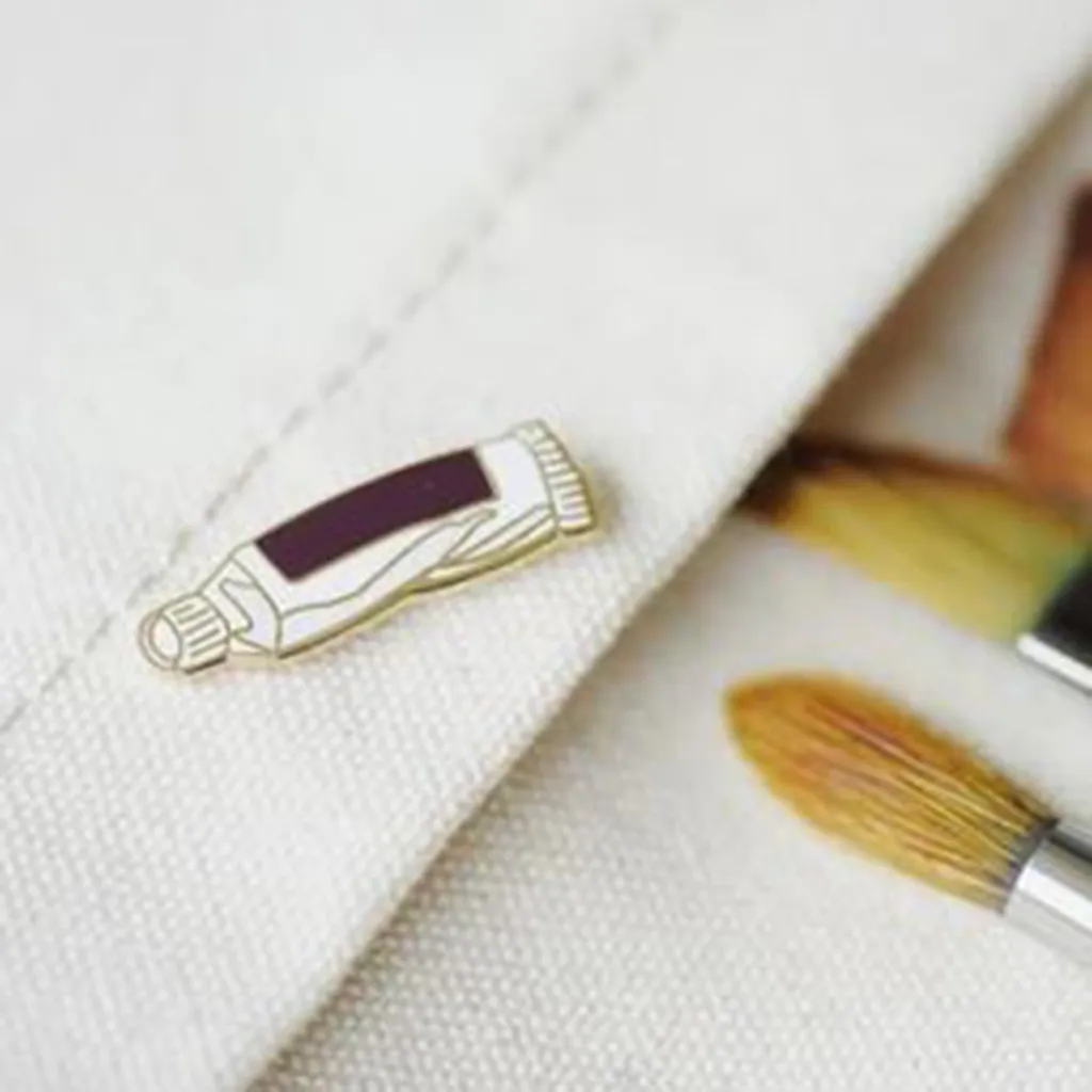 paint tube enamel pin.JPG
