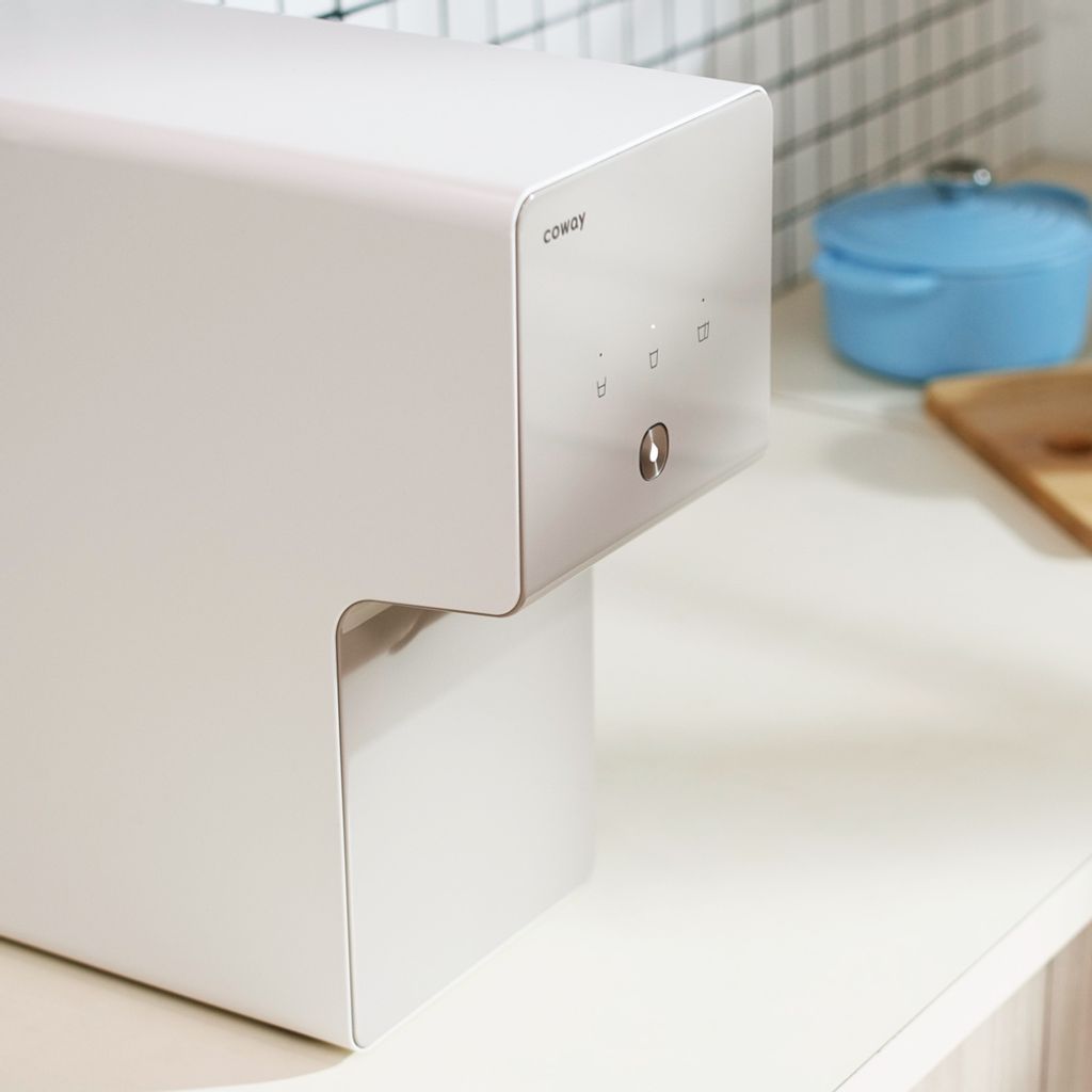 top-angle-view-of-home-water-purifier-with-touch-panel-being-displayed-coway-cinnamon