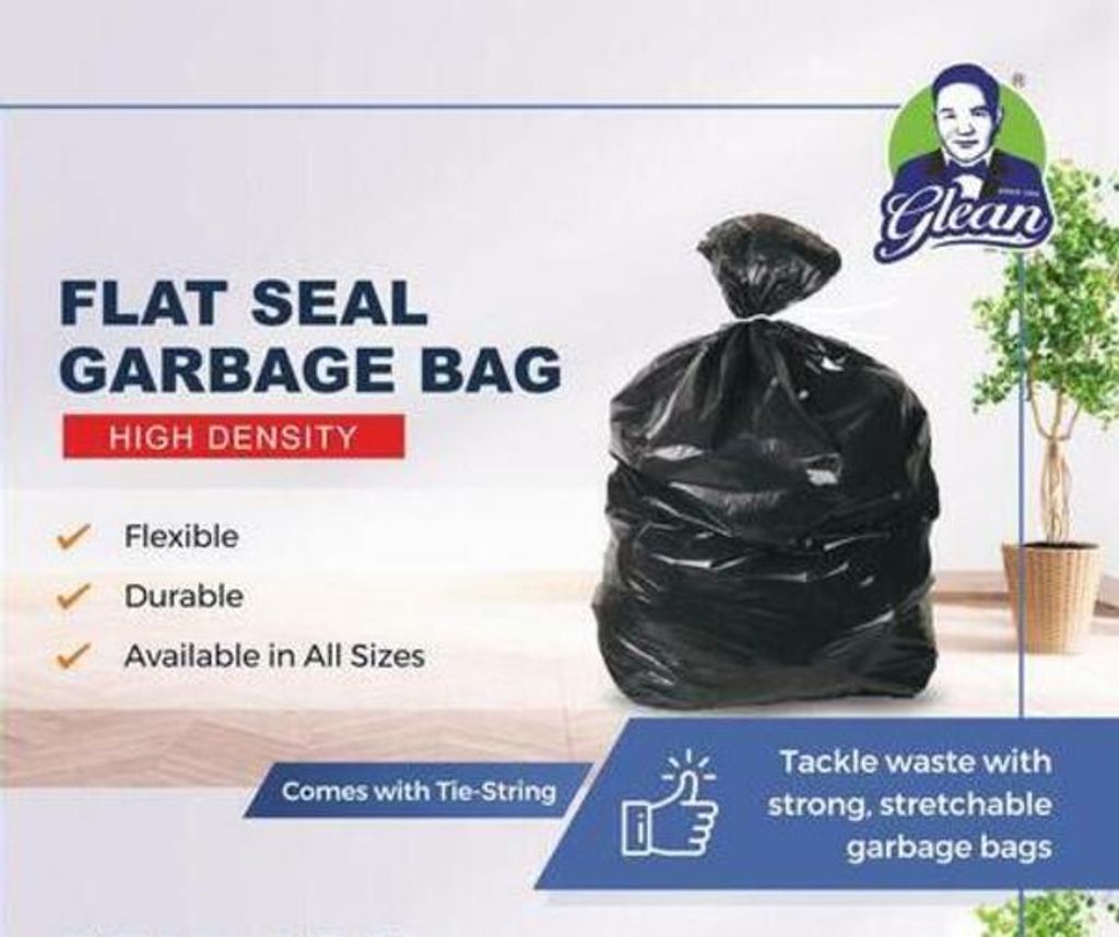 Garbage bag with tie string outlet