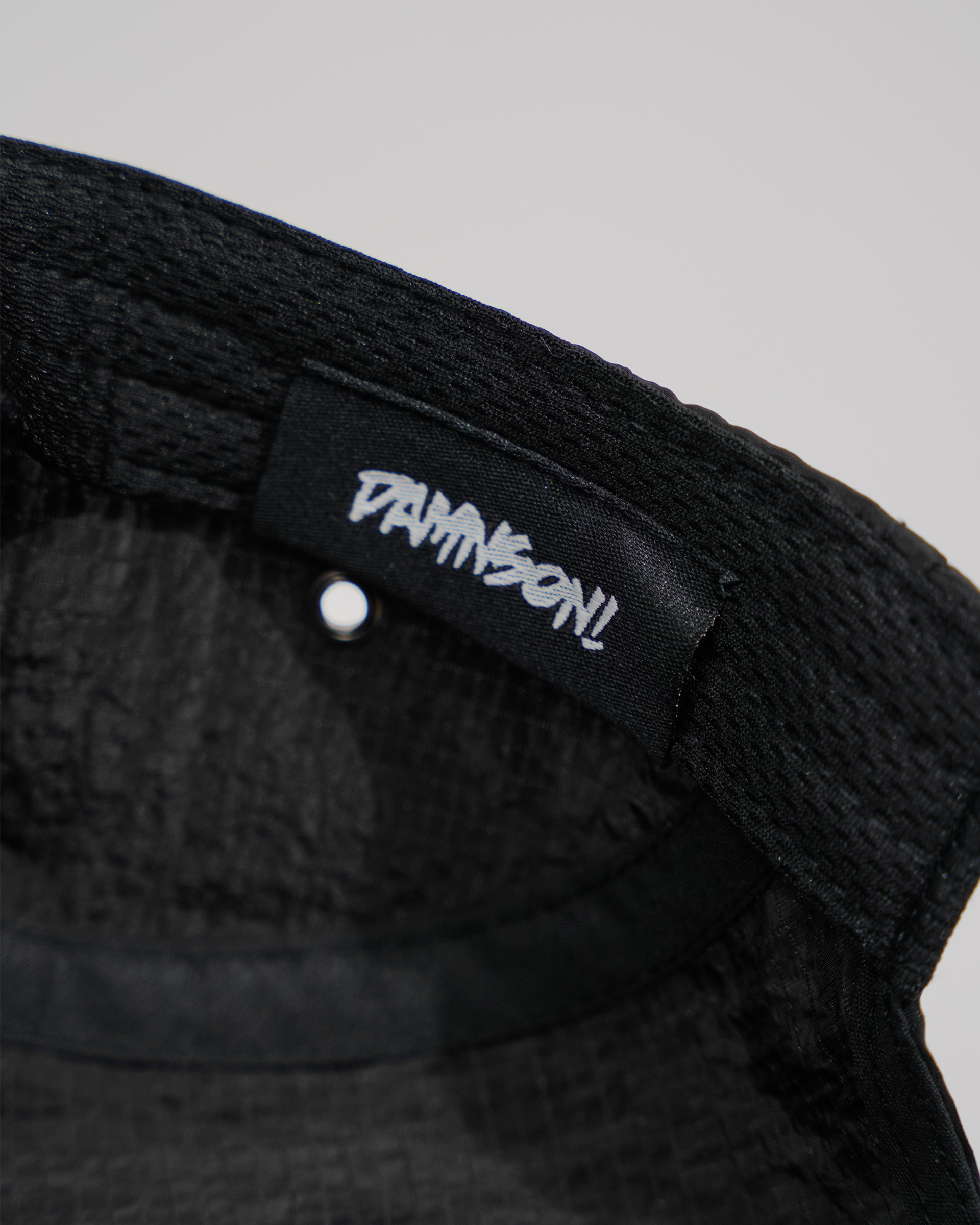 DMNSN OR HAT INSIDE