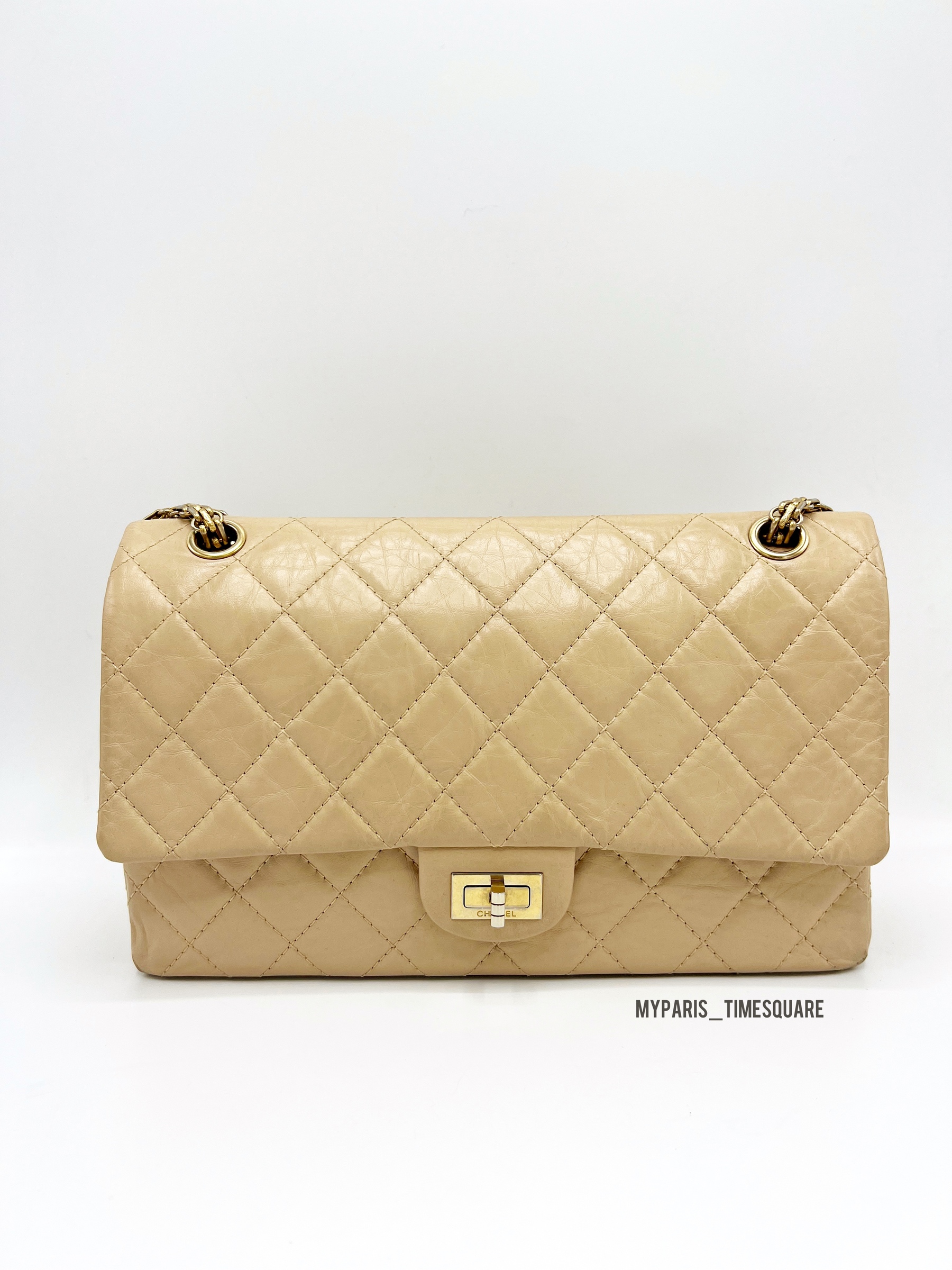 Chanel Mini 255 Reissue 19A Beige Quilted Aged Calfskin with shiny gold  hardware