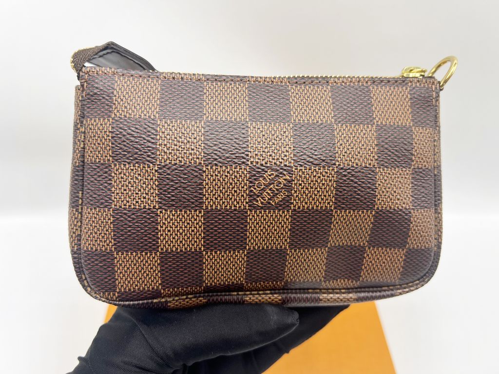 Authentic Louis Vuitton DAMIER EBENE Mini Pochette Accessoires N58009