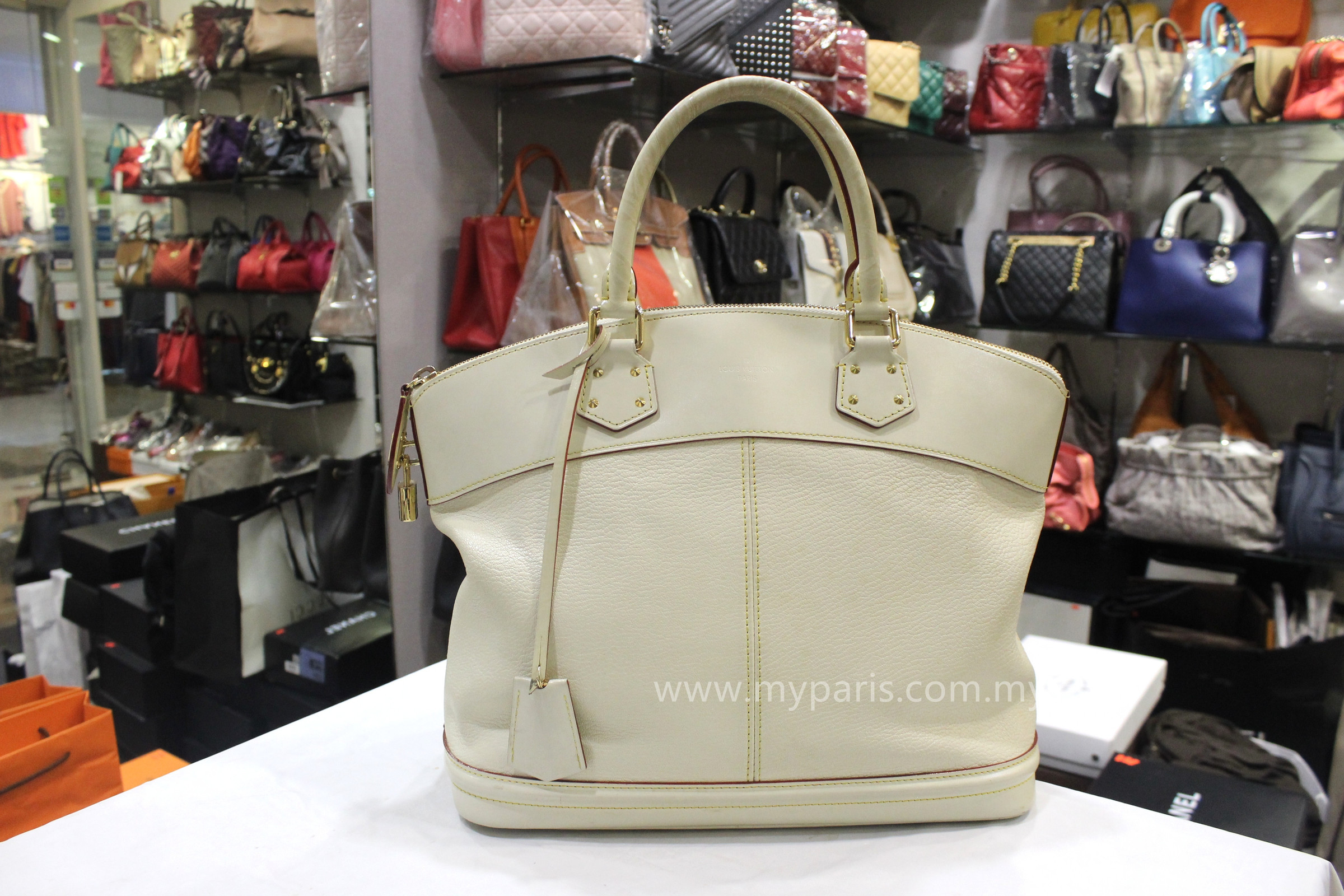 Louis Vuitton White Suhali Leather Lockit GM Bag – My Paris Branded  Station-Sell Your Bags And Get Instant Cash