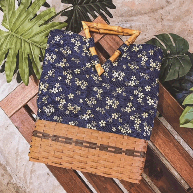 Item-7---Jutozi-Handmade-Triangle-Bamboo-Handle-Rattan-Handbag.png