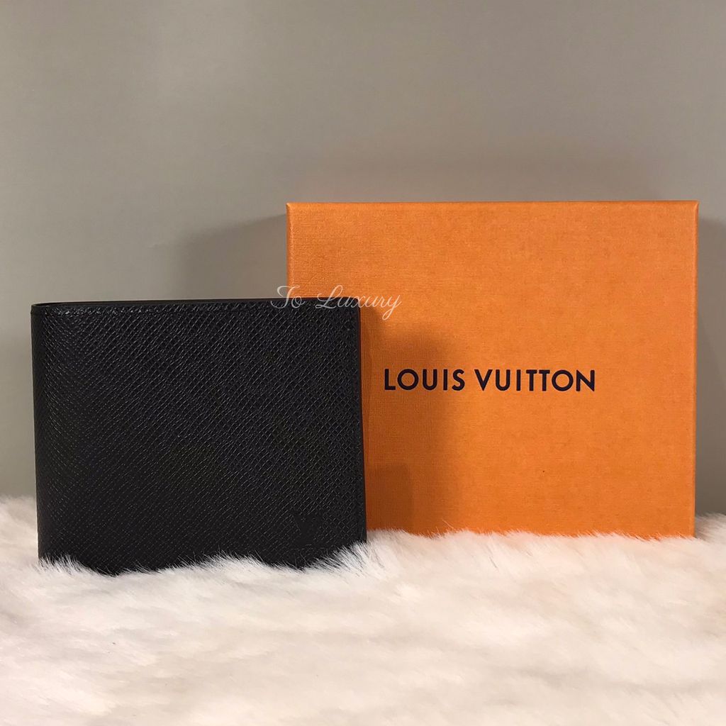 Shop Louis Vuitton TAIGA Amerigo wallet (M62045) by Bellaris