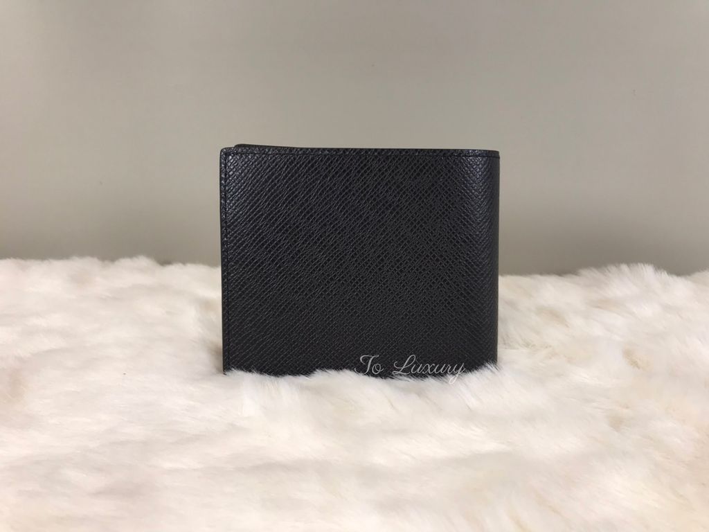 Shop Louis Vuitton Amerigo wallet (M62045) by treatmyself