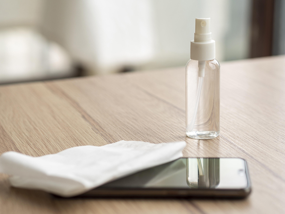 smartphone-cleaning-solution-desk-with-napkin.jpg