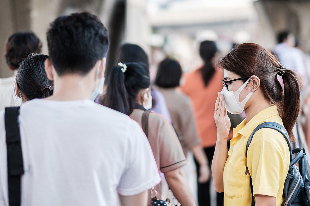 young-asian-woman-wearing-protection-mask-against-novel-coronavirus-2019-ncov-wuhan-coronavirus-public-train-station-is-contagious-virus-that-causes-respiratory-infection-healthcare-concept.jpg