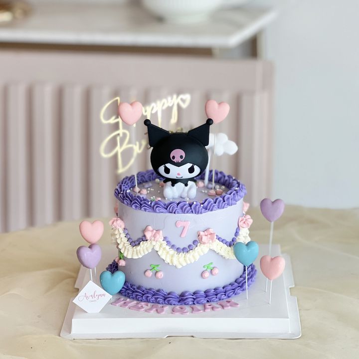 Kuromi-inspired dark magic cake