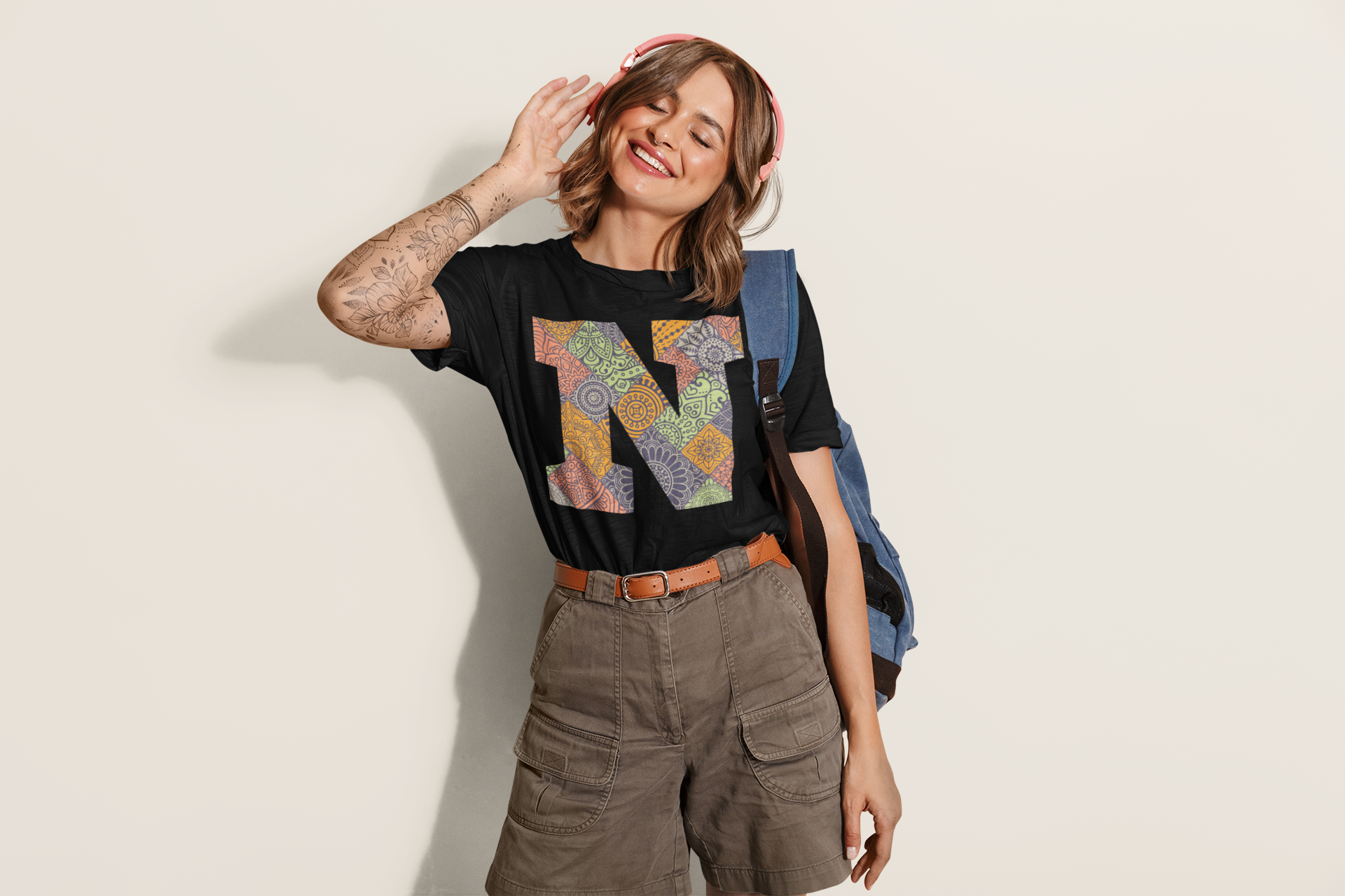 crew-neck-t-shirt-mockup-featuring-a-tattooed-woman-listening-to-music-46313-r-el2.png
