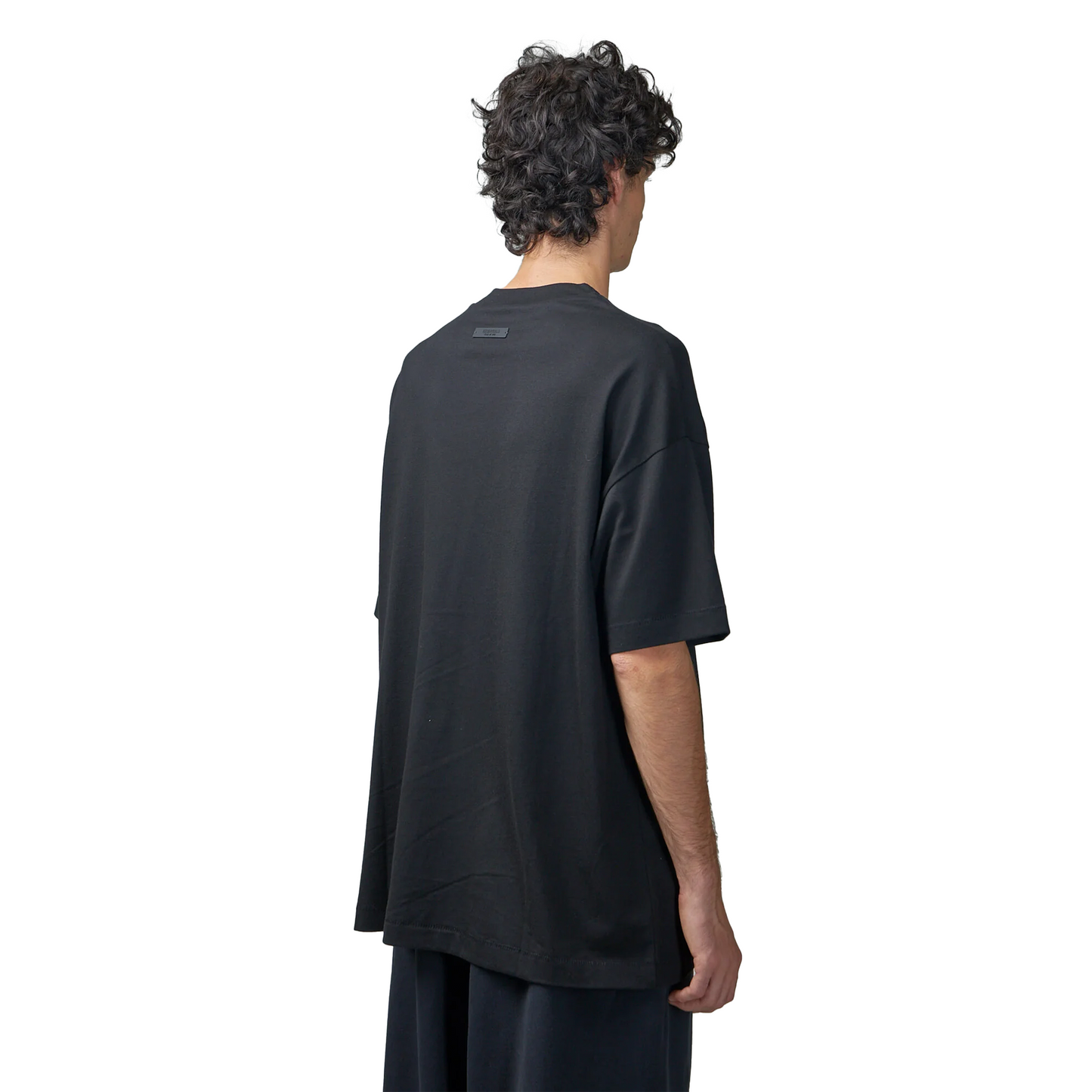 Fear_of_God_Essentials_Jersey_Crewneck_Tee_Black_FW24_-_Model_Back